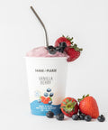 Vanilla Berry Protein Smoothie blended in a cup with garnish, without the protein banner.
