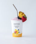 Pineapple Berry Protein Smoothie blended in a cup without garnish.